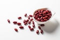 Red beans beautifully laid out on a white background. in a cup. Top view. copy space. Vegetarian food
