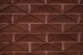 Red beautiful new brick wall texture background. Bricks with fish scales polygonal pattern Royalty Free Stock Photo