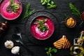 Red beet soup with sour cream. Ukrainian cuisine, Borsch soup. Top view. Free space for your text. Royalty Free Stock Photo