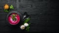 Red beet soup with sour cream. Ukrainian cuisine, Borsch soup. Top view. Free space for your text. Royalty Free Stock Photo