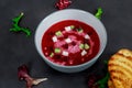 Red beet and tomato cream soup with ricotta and bread Royalty Free Stock Photo