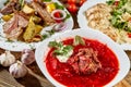Red beet vegetable soup borscht on wooden background. Ukrainian and russian national food. Close-up. Royalty Free Stock Photo