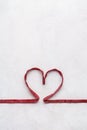 Red beetroot pasta shaped as heart. Valentines Day greeting card