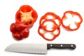 Red bell pepper and santoku knife on white background