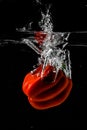 Red bellpepper splashing Royalty Free Stock Photo