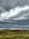 Red Bench in Easky Ireland- ocean view- cloudy day