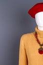 Red beret, necklace and yellow sweater. Royalty Free Stock Photo