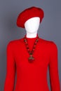 Red beret and pullover on mannequin. Royalty Free Stock Photo