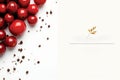 red berries and coffee beans on a white background Royalty Free Stock Photo