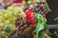 Red berries and Pine cone background