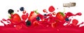 Red berry juice splash wave. Whole and sliced strawberry, raspberry, cherry, blueberry and blackberry in a sweet juce Royalty Free Stock Photo