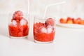 Red berry lemonade in glass jar on a wooden background with lemon slices, honey and ice. Top view Royalty Free Stock Photo