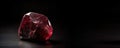 Red beryl is a rare precious natural stone on a black background. AI generated. Header banner mockup with space Royalty Free Stock Photo