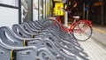 A Red Bicycle parked outside a store Royalty Free Stock Photo