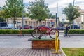 Red Bicycle on a wooden pedestal, opposite the entrance to Gorky Park