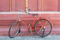 Red bike and pink wall, purple Royalty Free Stock Photo