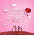 Red bikes parked on the grass with heart shaped balloons floati Royalty Free Stock Photo