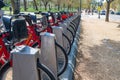 Red Bikeshare Bicycles Lined Up at a Public Docking Station in Washington DC Royalty Free Stock Photo