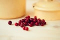 Red bilberry, cowberry, fowberry, redberry, cranberry on wooden background