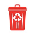 Red bin with recycling symbol denotes waste sorting or eco lifestyle practices Royalty Free Stock Photo