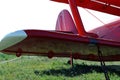 red biplane wing on the ground Royalty Free Stock Photo
