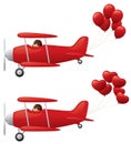 Red biplanes towing balloons. Royalty Free Stock Photo