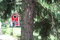 Red bird house Royalty Free Stock Photo