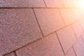 Red Bituminous Roof Shingle Texture Background with Granular Surface Royalty Free Stock Photo