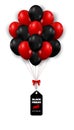 Red and black balloons with black friday tag isolated on white background as discount promotion , sale and marketing template Royalty Free Stock Photo