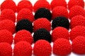 Red and black candy gum drops