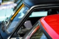 Red and black cars in the parking lot Royalty Free Stock Photo