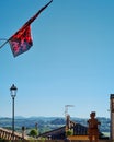 Red and Black checkerboard flag in Orte