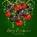 Red and black Christmas balls and golden streamers on green knit Royalty Free Stock Photo