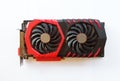 Red and black Computer graphics card isolated on white background. Close-up of video card. Royalty Free Stock Photo