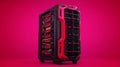 Red and Black Computer Tower on Pink Background Royalty Free Stock Photo