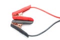 Red and black cooper jumper cable isolated on white background. Power supply wire for car battery. Top view