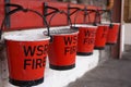 Red & Black Fire Buckets Royalty Free Stock Photo