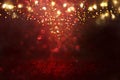 Red, black and gold glitter vintage lights background. defocused. Royalty Free Stock Photo