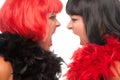 Red and Black Haired Women Screaming at Each Other Royalty Free Stock Photo