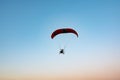 Red and black hang glider in the sky Royalty Free Stock Photo
