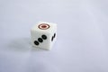 Red and black number symbols on white dice