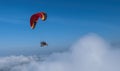 Gliding high over cloud in paramotor.