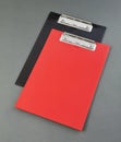 Red and black plastic clipboard