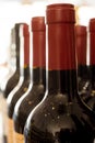 Red and Black Sealed Wine Bottle Necks Royalty Free Stock Photo