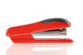 Red and black stapler isolated with reflection Royalty Free Stock Photo