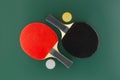 Red and black table tennis racks with balls Royalty Free Stock Photo