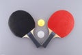 Red and black table tennis racks with balls Royalty Free Stock Photo