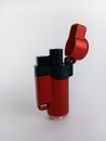 Red and black torch lighter isolated on a white background Royalty Free Stock Photo