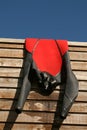 A red & black wetsuit