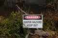 Red, black and white Danger, Water Hazard Keep Out warning sign Royalty Free Stock Photo